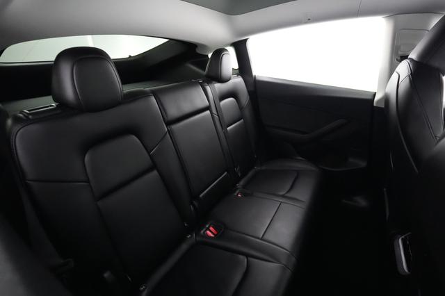 2025 Tesla Model Y — photo 4 of 21