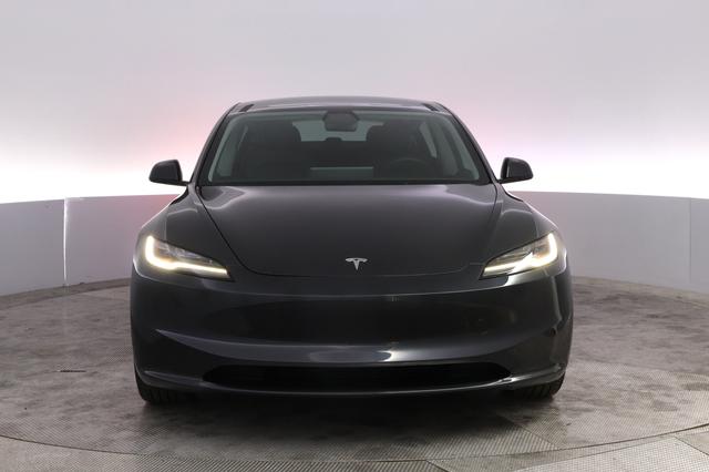 2025 Tesla Model 3 — photo 9 of 21