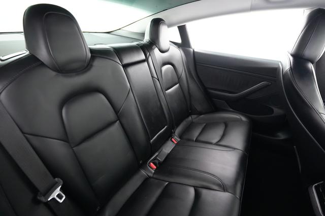 2021 Tesla Model 3 — photo 4 of 24