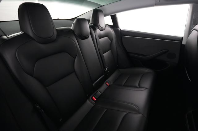 2025 Tesla Model 3 — photo 4 of 24